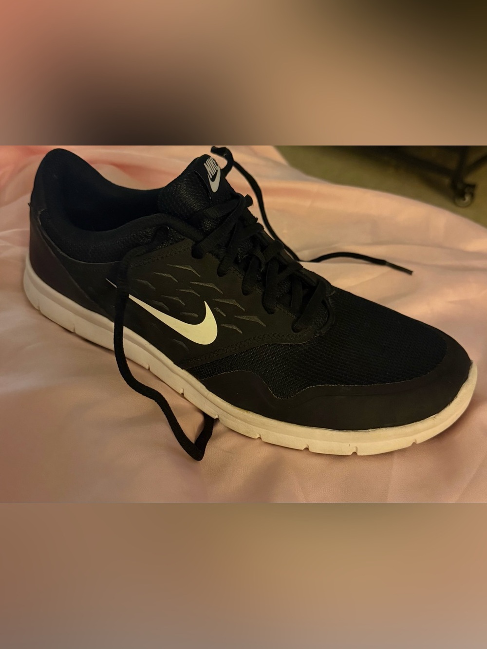 Nike Black Athletic Sneakers with White Swoosh and White Sole